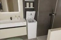 Candy | Washing Machine | TCA284TM5-S | Energy efficiency class A | Top loading | Washing capacity 8 kg | 1200 RPM | Depth 60 cm | Width 41 cm | Display | Digit | White – pilt 6